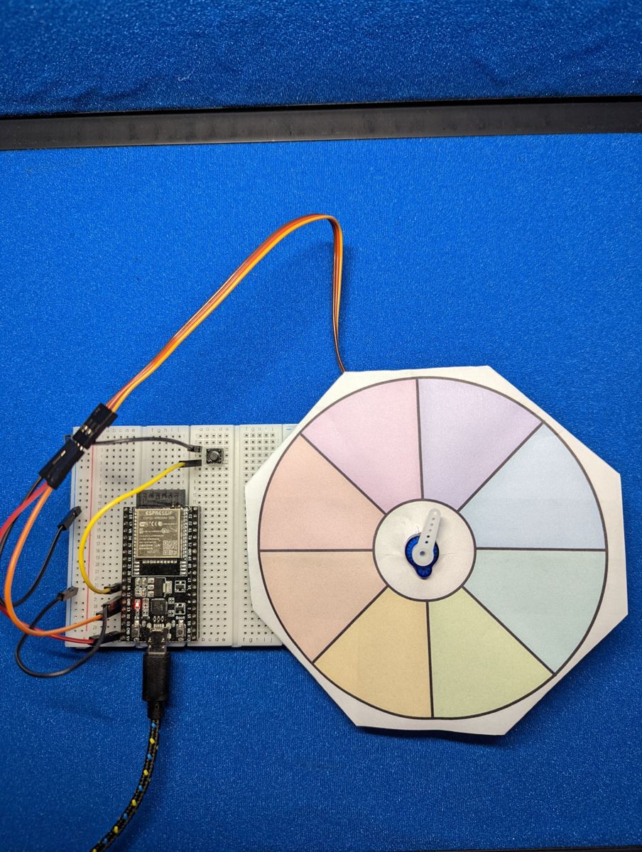 Fortune Teller spinner made from a servo and a paper wheel